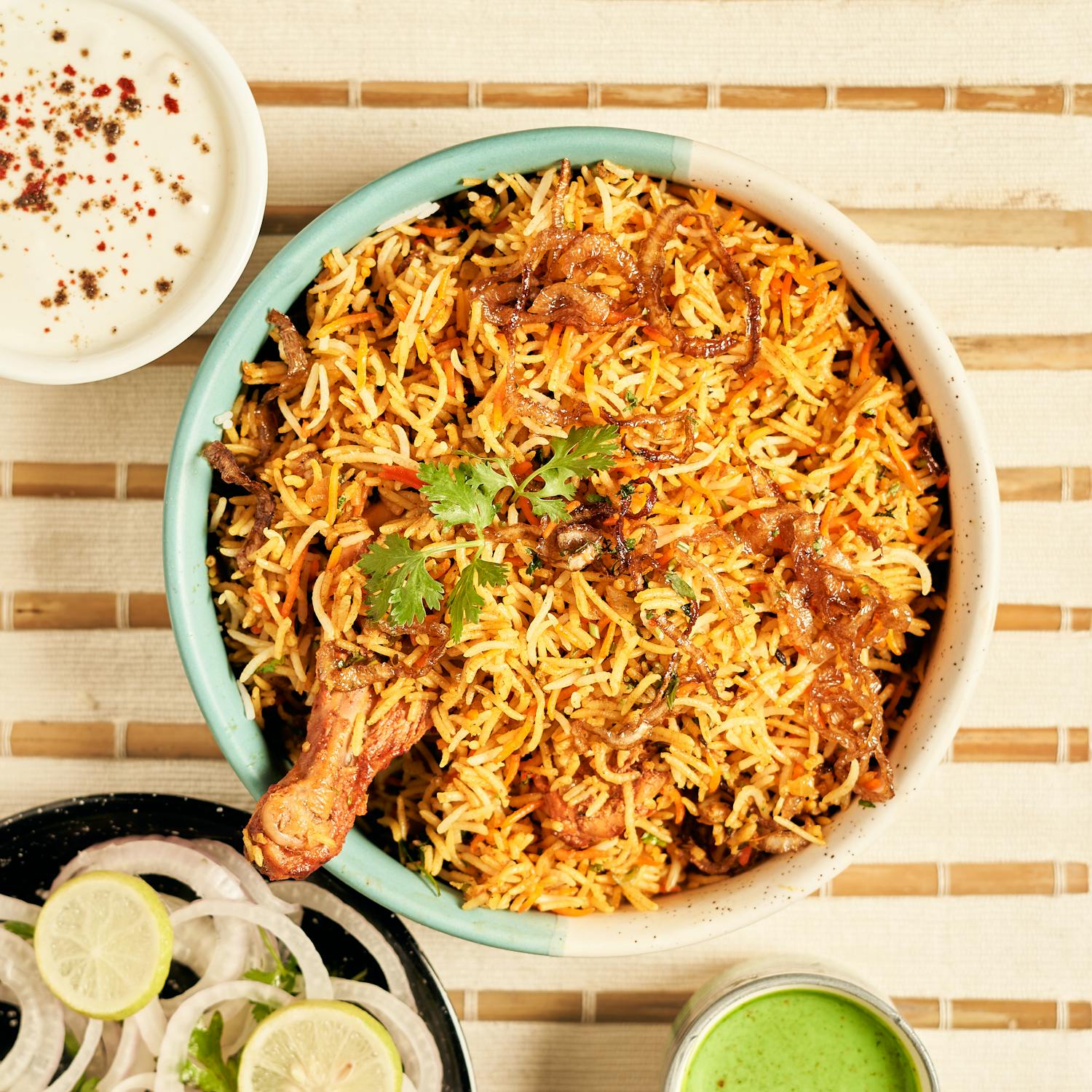 A magnificent, authentic Shah Biryani feast with rich colors and aromatic steam